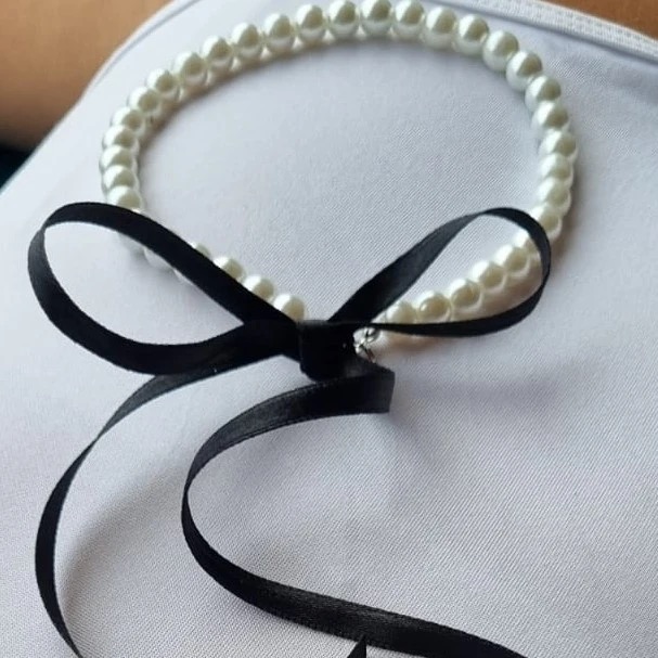 Collar Black Moth